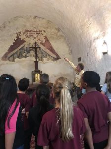 Students viewing mission fresco