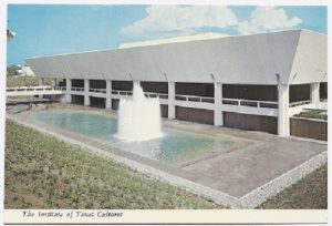 Color postcard showing the Institute of Texan Cultures building behind a large fountain.